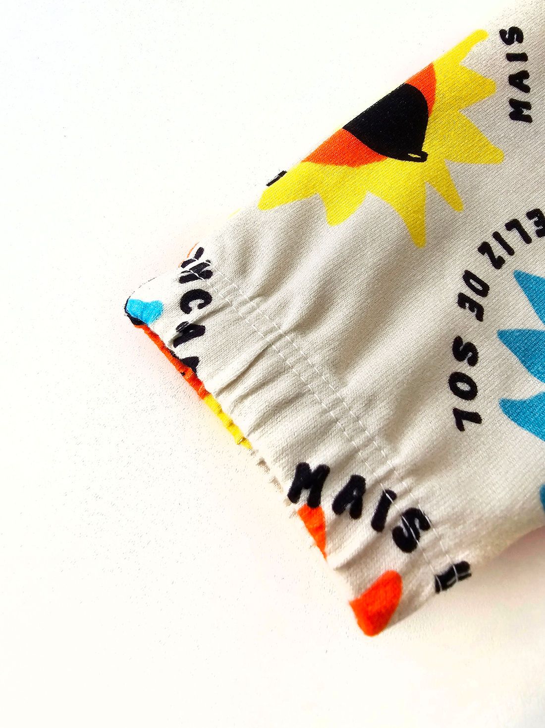 CALÇA UNISSEX MOLETINHO SOL COLORIDO