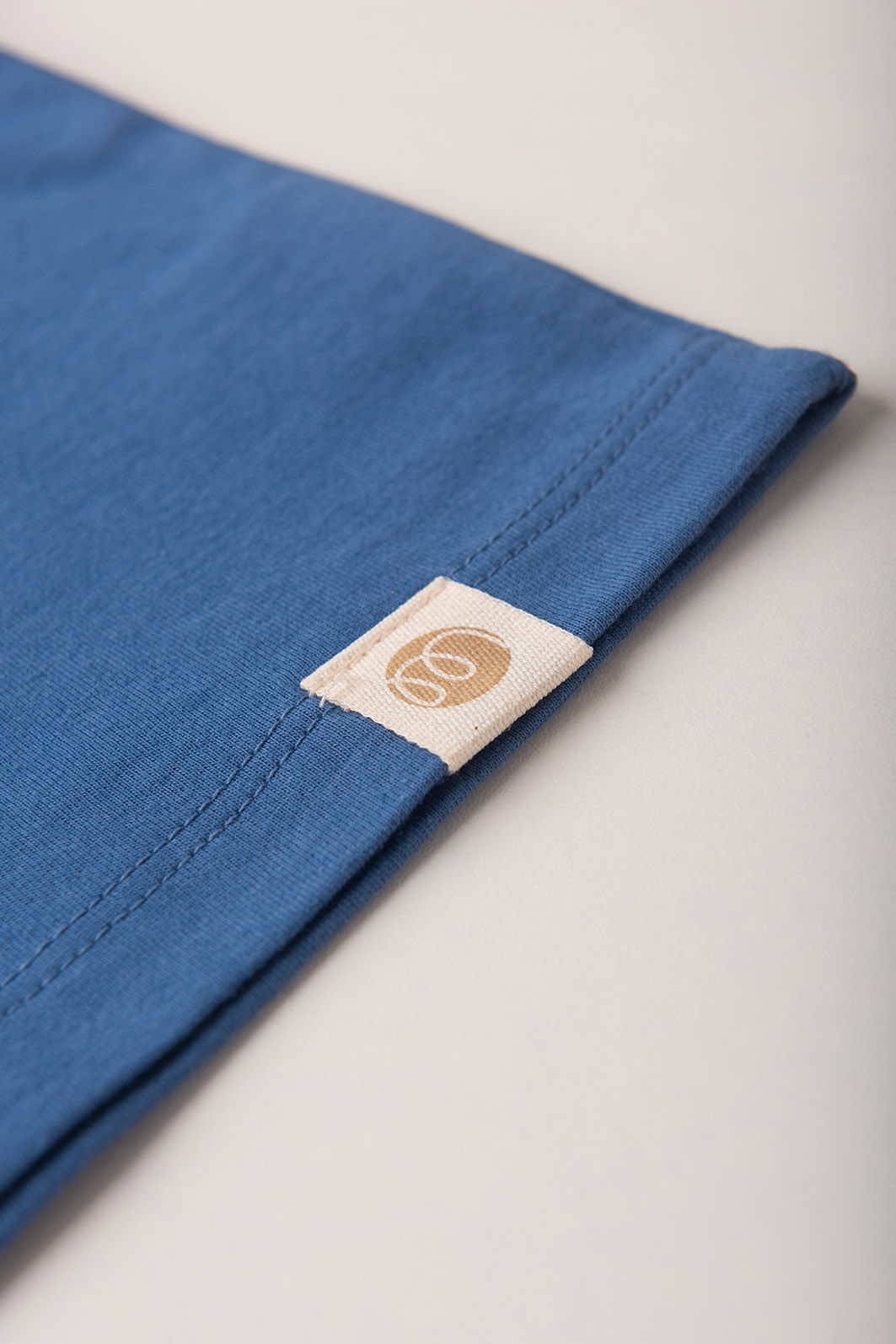 Conjunto Menina Blusa Box Manga Curta Azul Anil e Saia com Shorts Azul Anil