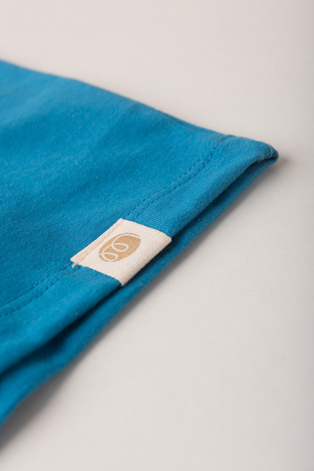 Conjunto Menina Blusa Over Manga Curta Azul Turquesa e Shorts Babado - Azul Turquesa Conjunto Menina Blusa Over Manga Curta Azul Turquesa e Shorts Babado - Azul Turquesa