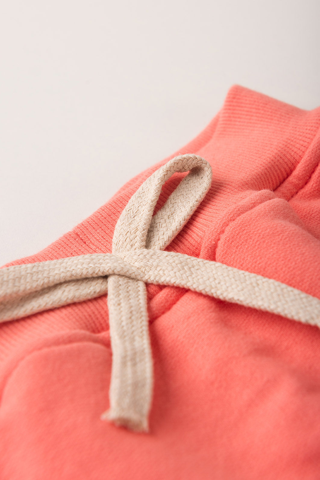 Shorts Saia Menina 100% Algodão Sustentável - Rosa Coral Shorts Saia Menina 100% Algodão Sustentável - Rosa Coral