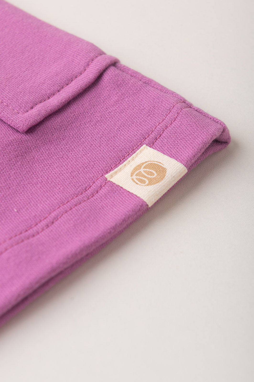 Conjunto Menina Blusa Box Manga Curta Azul Turquesa e Saia com Shorts Lilás Lavanda