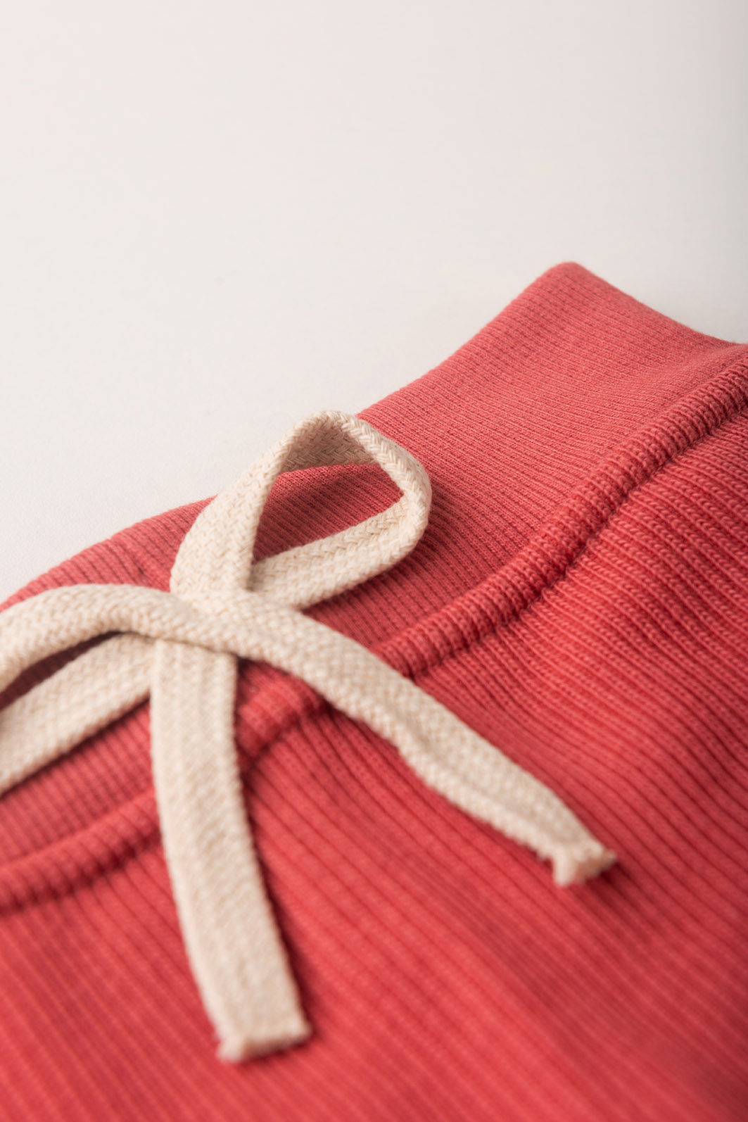 Saia Menina Com Shorts Moletom Texturizado Algodão Sustentável - Vermelho Cedro Saia Menina Com Shorts Moletom Texturizado Algodão Sustentável - Vermelho Cedro