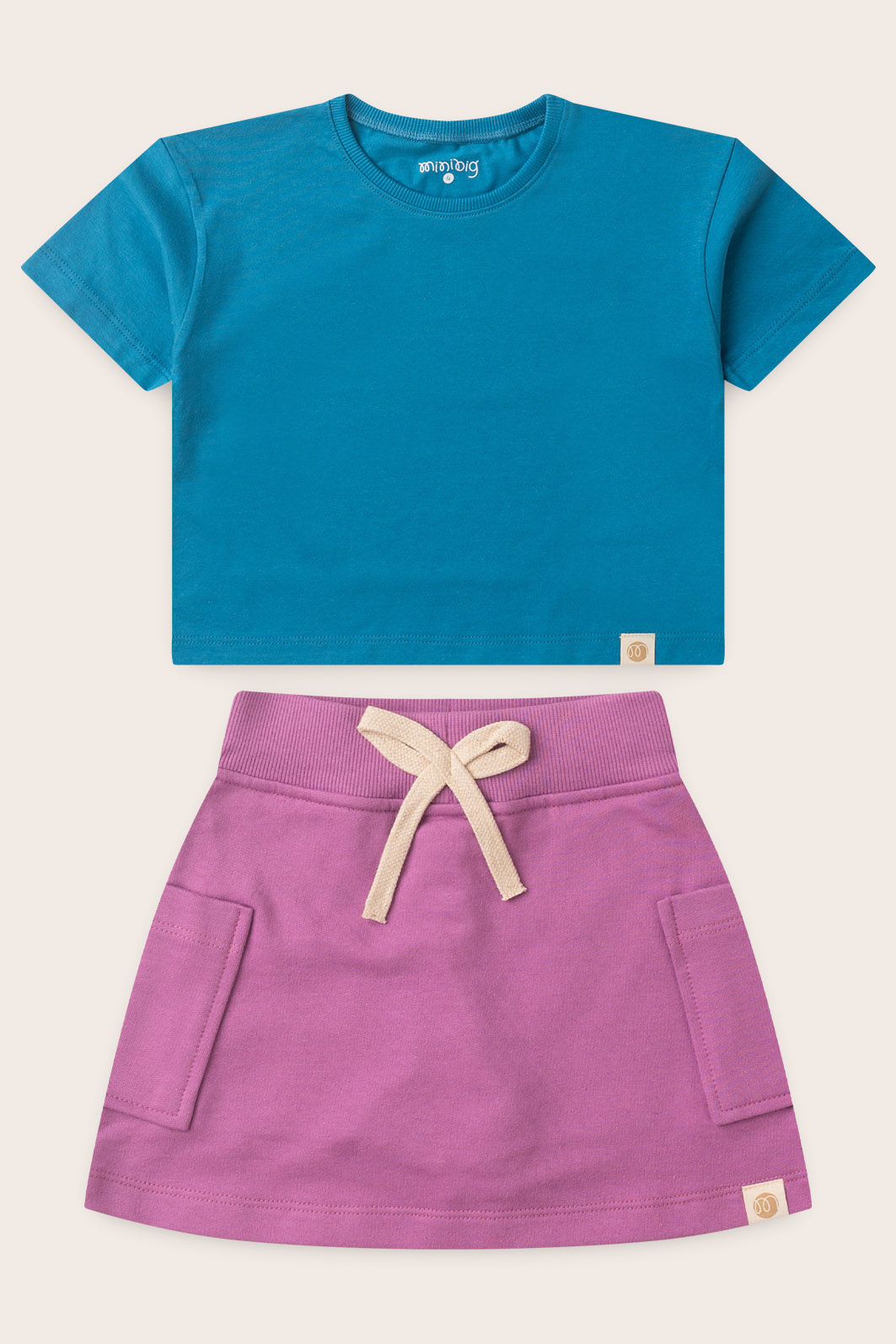 Conjunto Menina Blusa Box Manga Curta Azul Turquesa e Saia com Shorts Lilás Lavanda