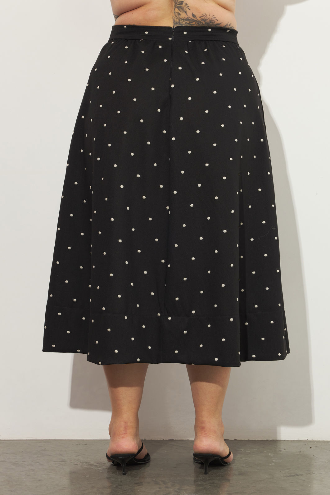 Saia Midi Evasê Doroty Poá