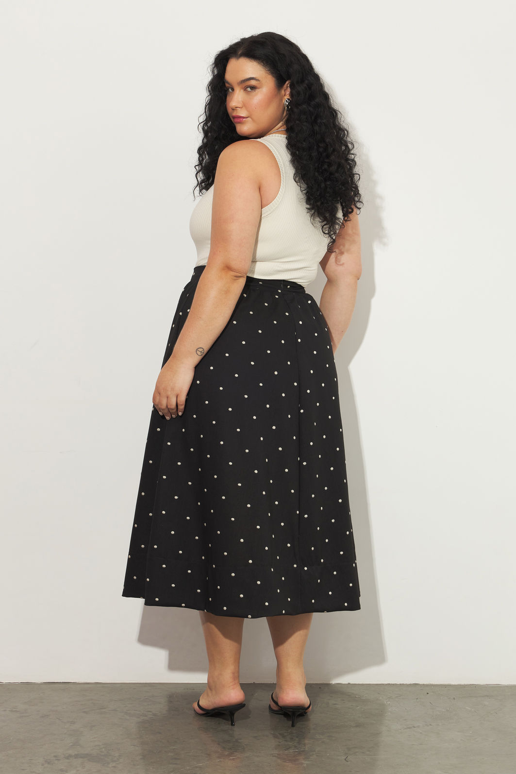 Saia Midi Evasê Doroty Poá