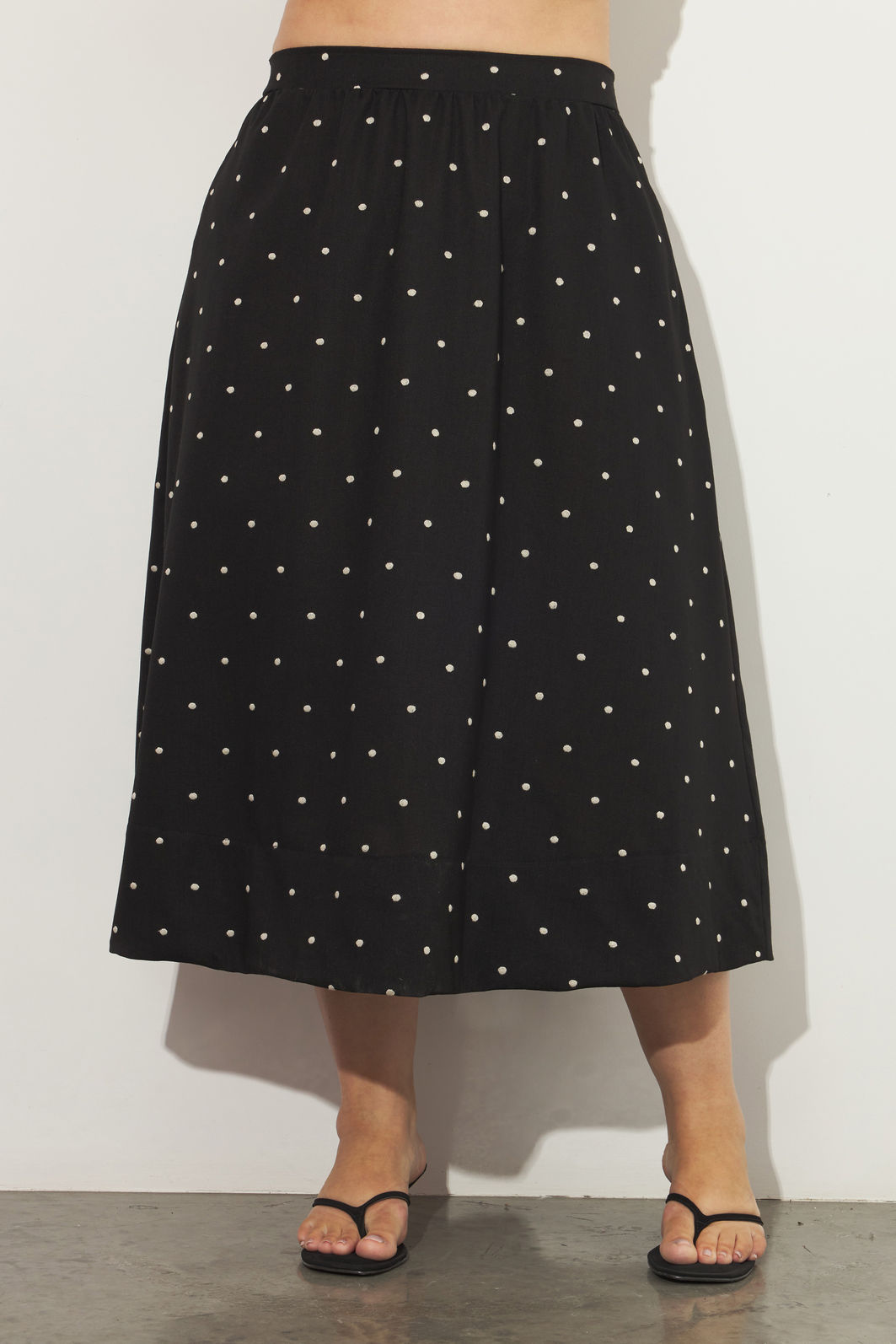 Saia Midi Evasê Doroty Poá