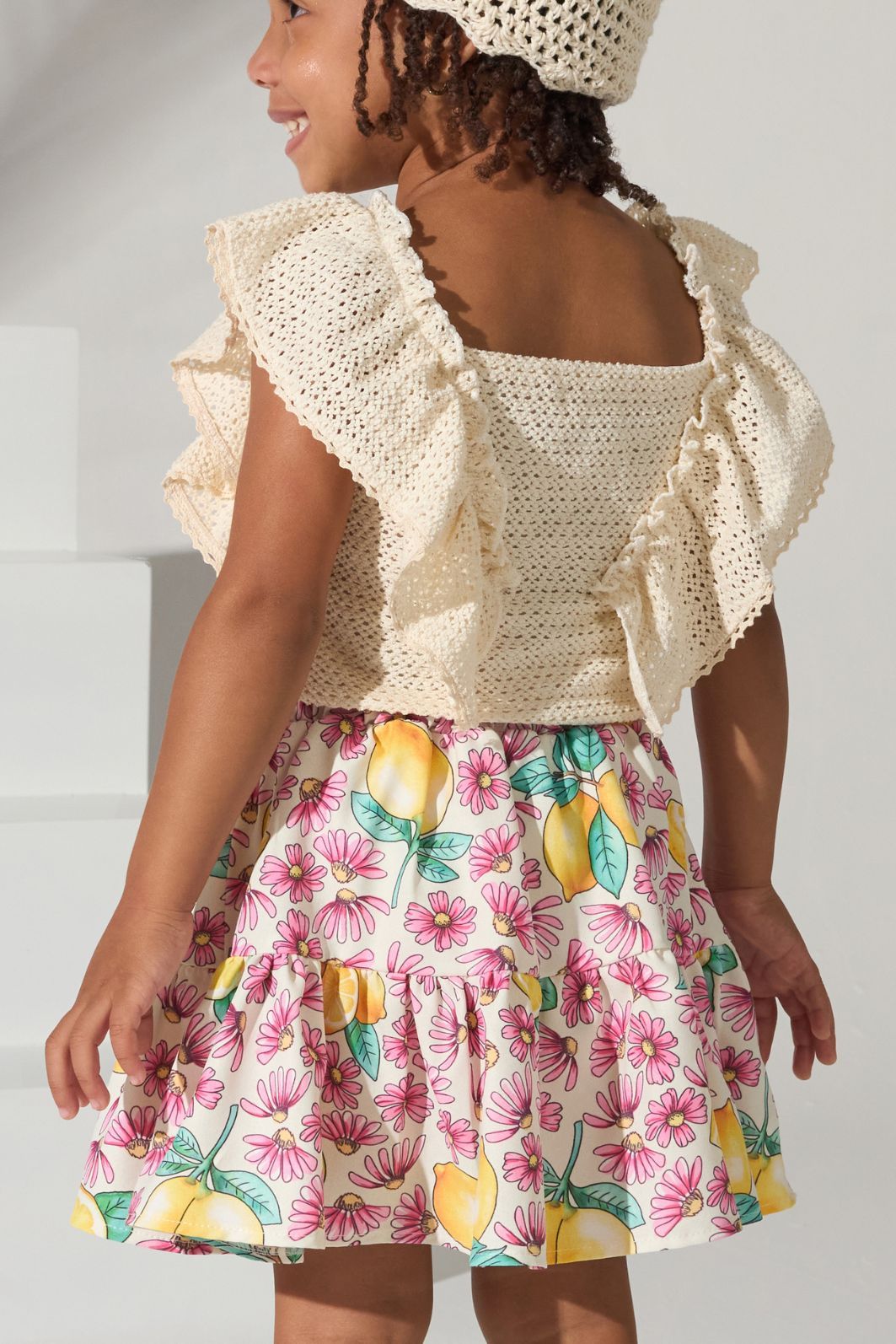 Conjunto blusa de tricô e saia estampada Conjunto blusa de tricô e saia estampada