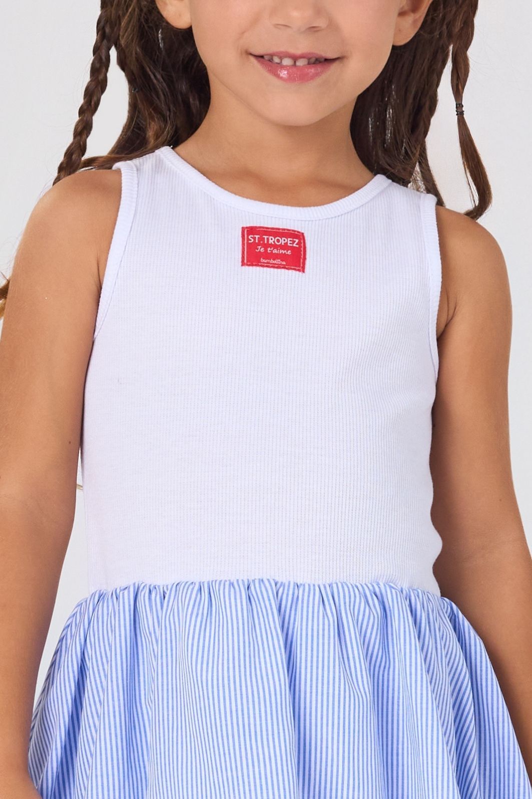 Vestido de ribana e saia balonê listrado