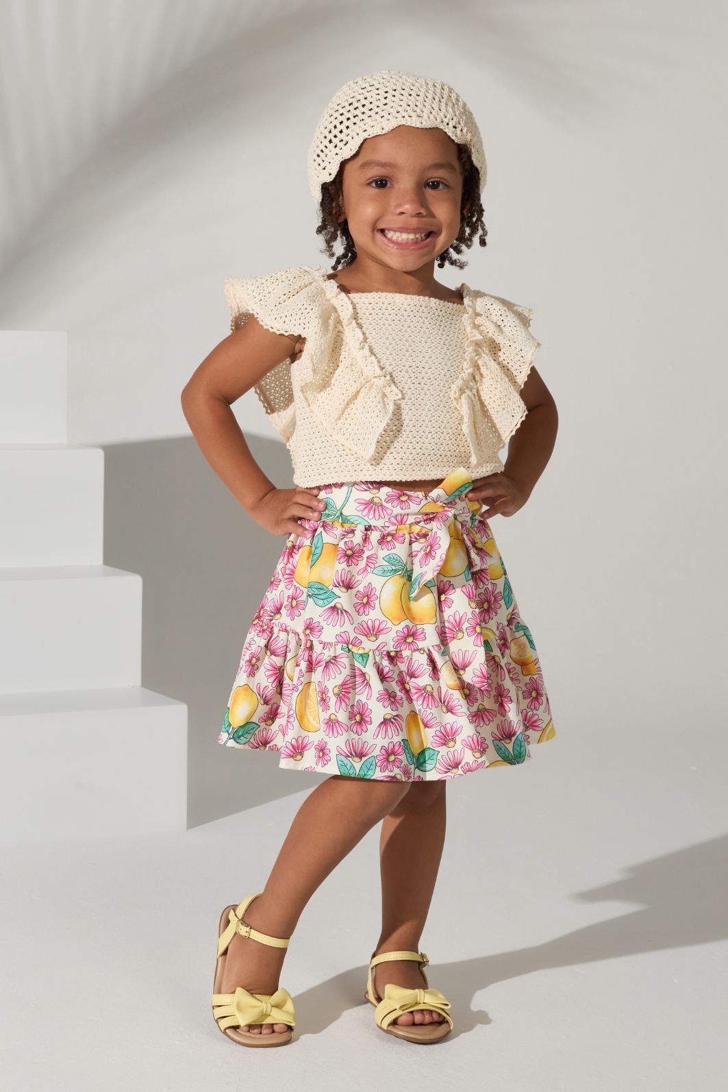 Conjunto blusa de tricô e saia estampada Conjunto blusa de tricô e saia estampada