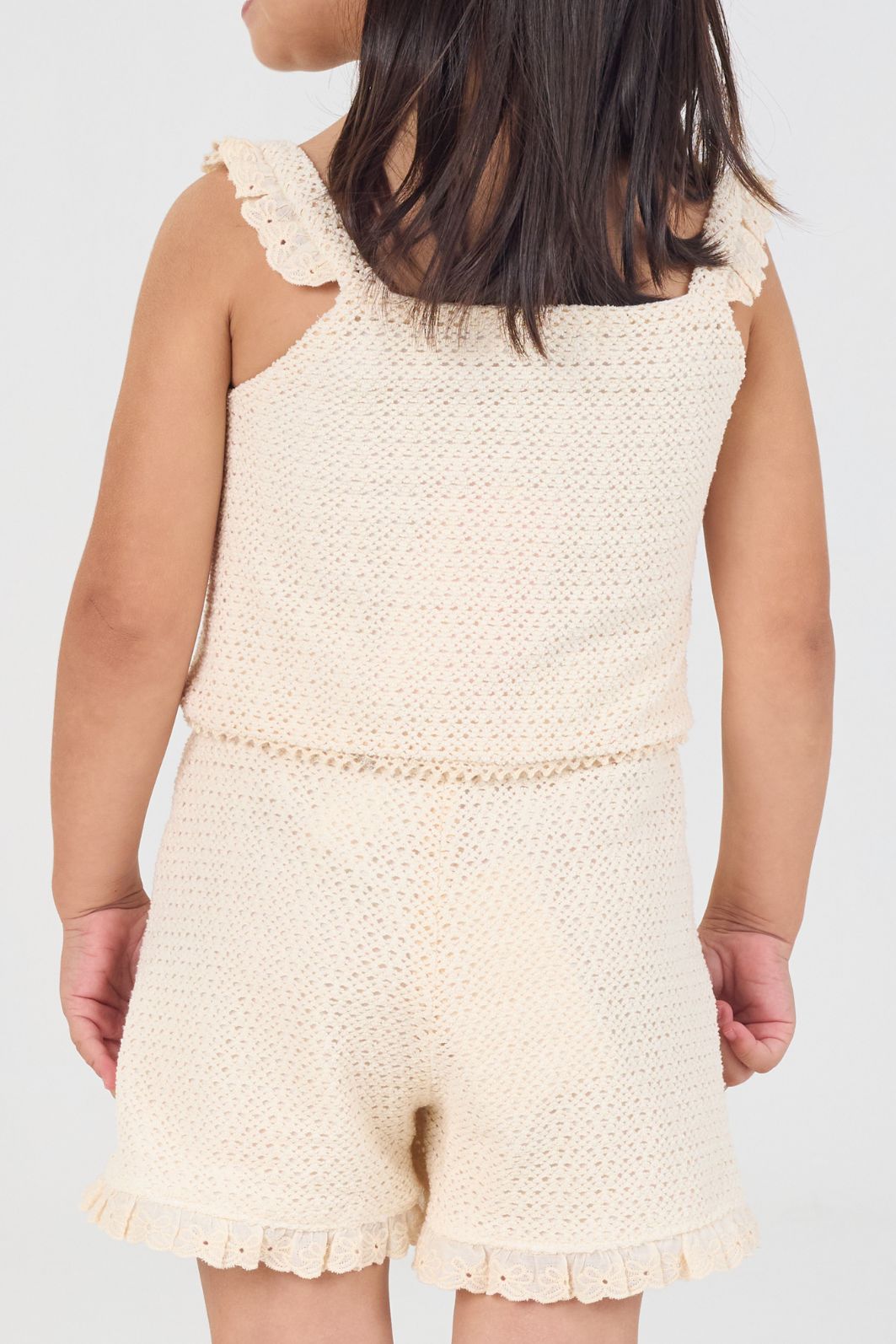 Conjunto de top e short de castelhanos