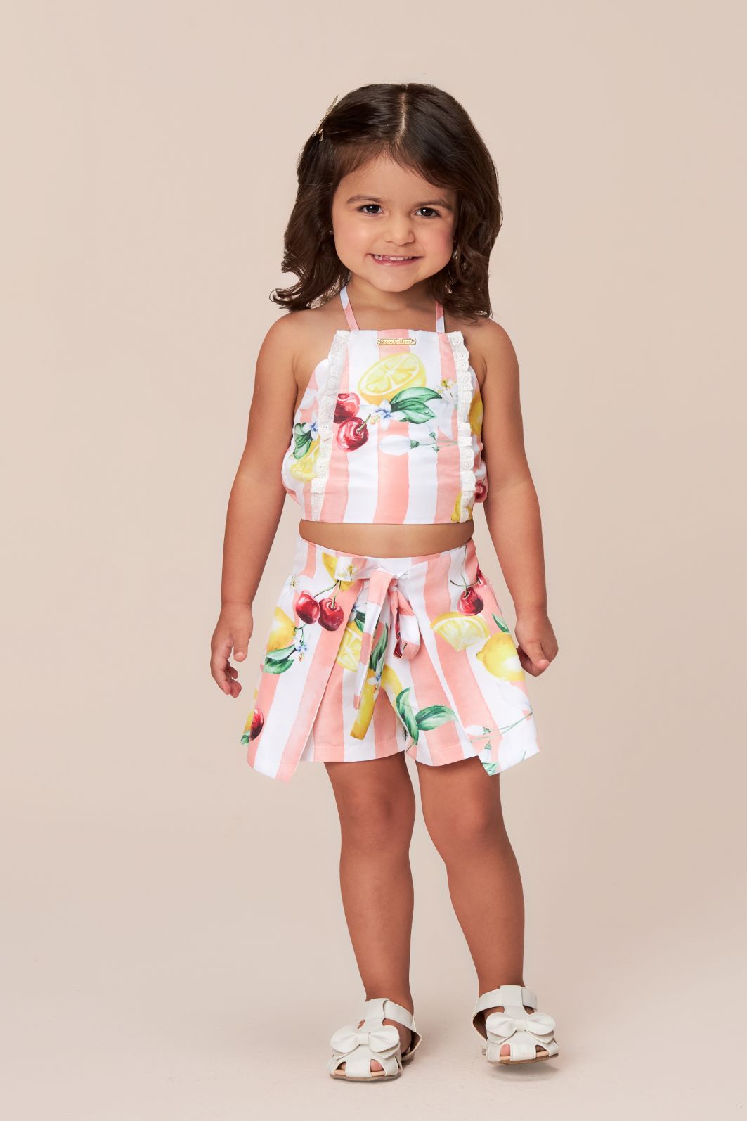 Conjunto top e short-saia estampa frutas