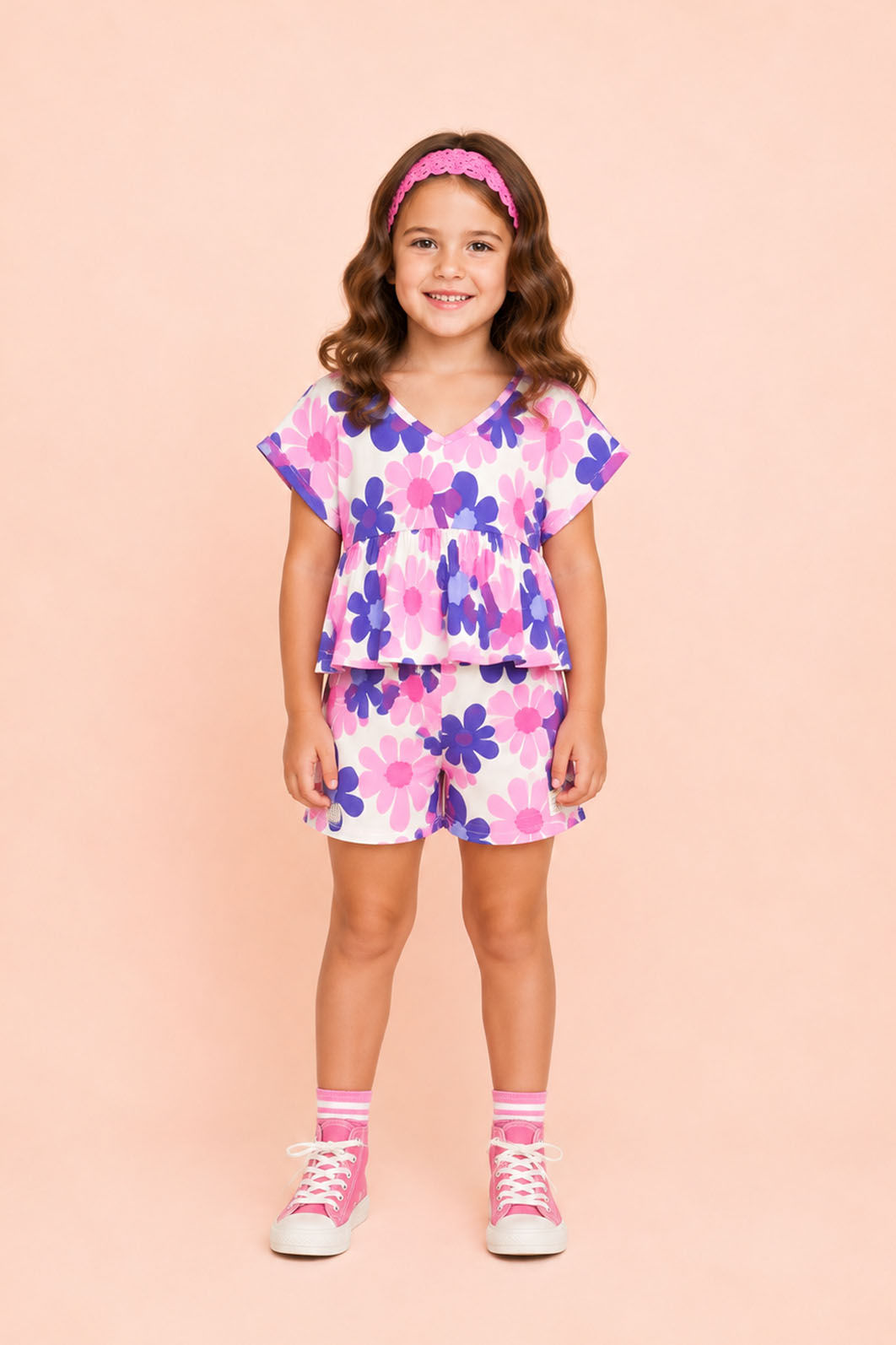 Conjunto blusa e short em estampa floral Conjunto blusa e short em estampa floral