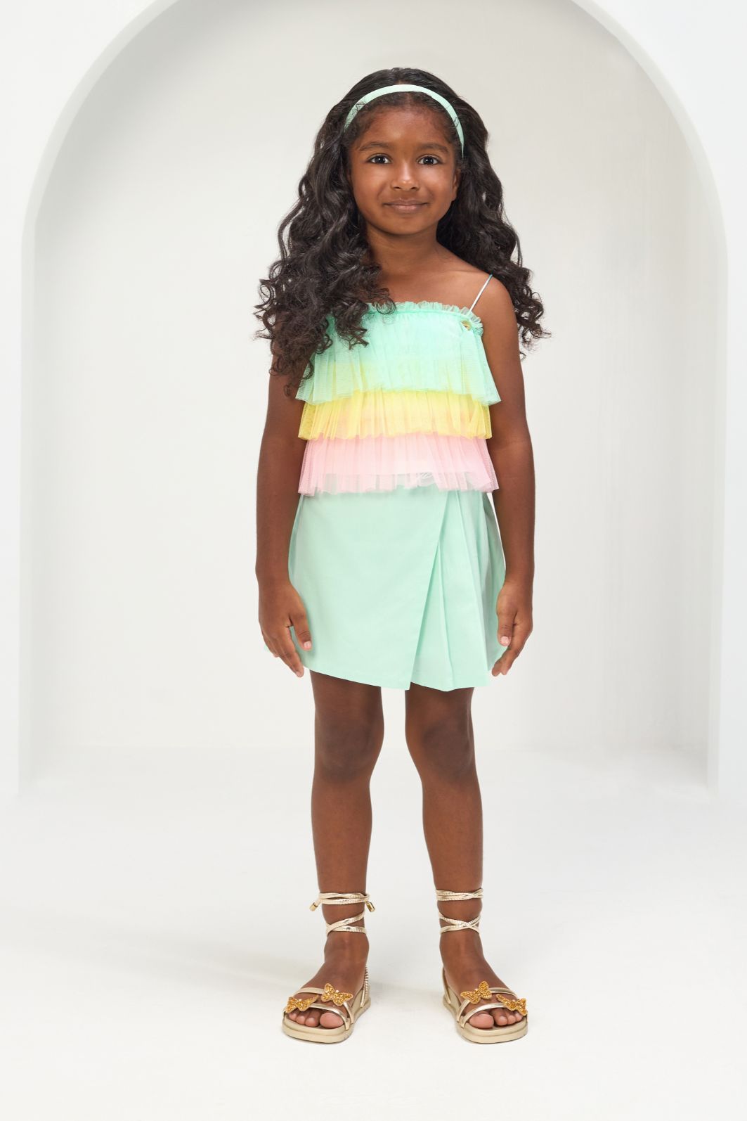 Conjunto com blusa de tule e short saia de cotton