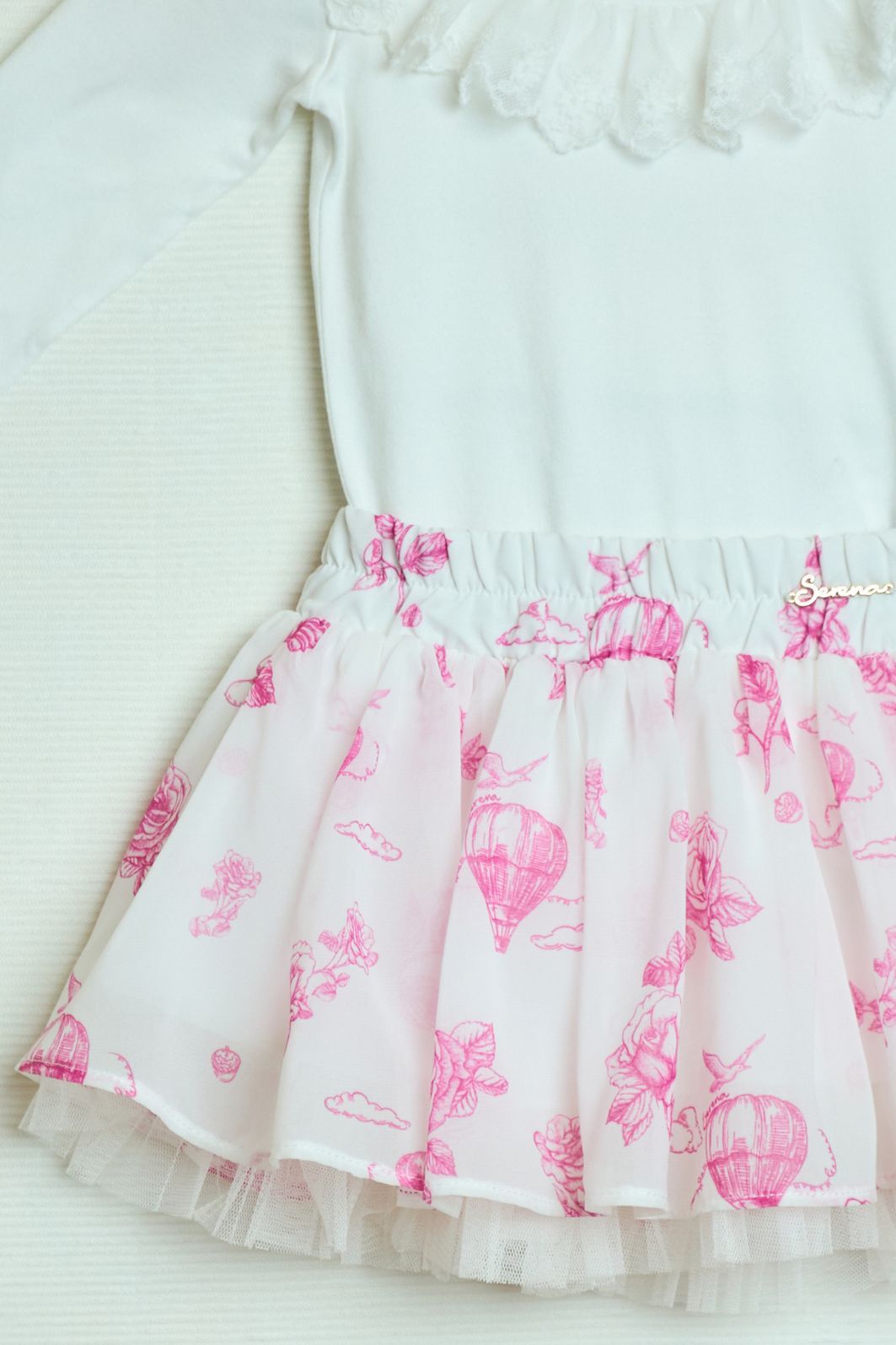 Conjunto com body modal suede e saia estampada