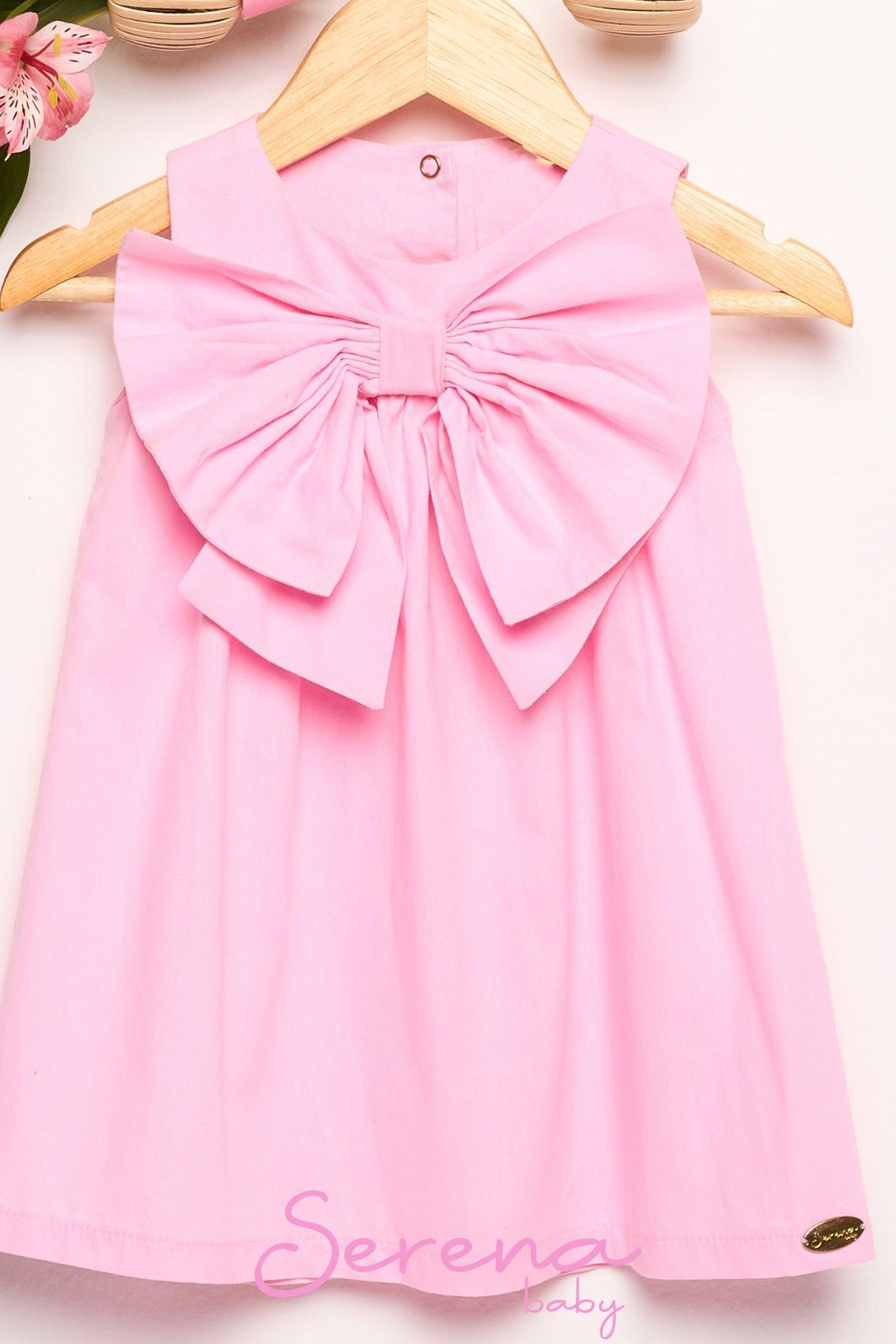 Vestido de tricoline com laço no peito Vestido de tricoline com laço no peito