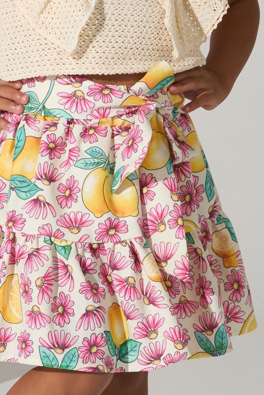 Conjunto blusa de tricô e saia estampada Conjunto blusa de tricô e saia estampada