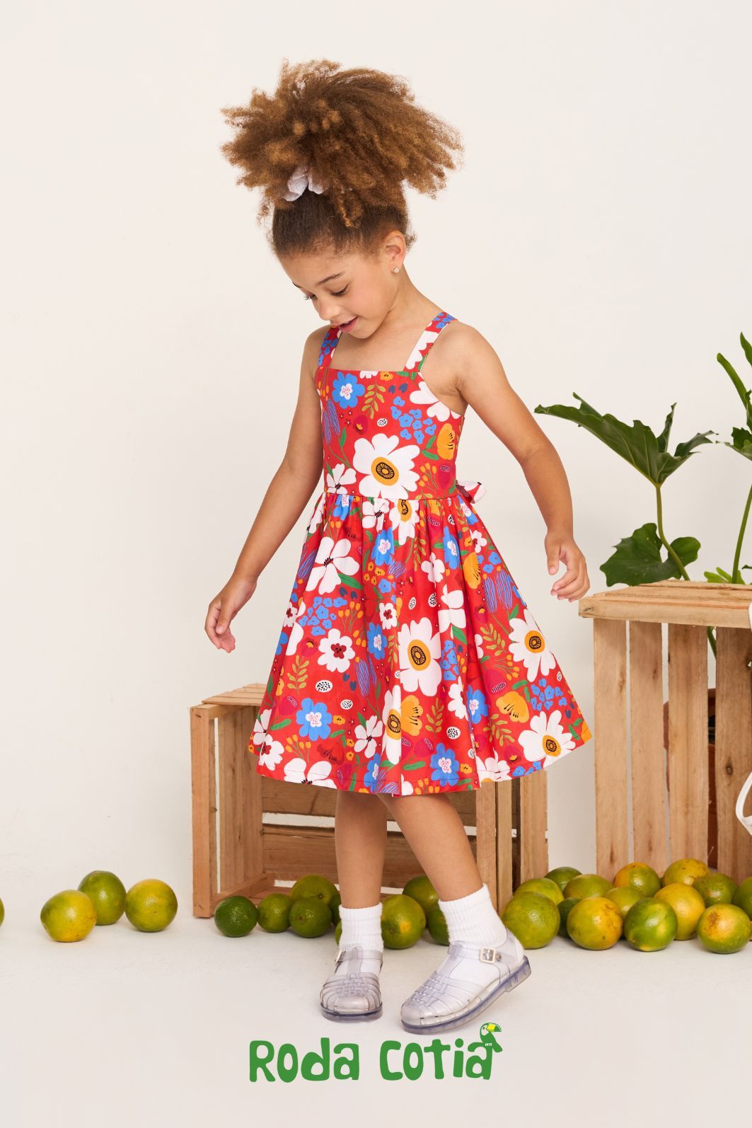 Vestido estampado com amarração nas costas Vestido estampado com amarração nas costas