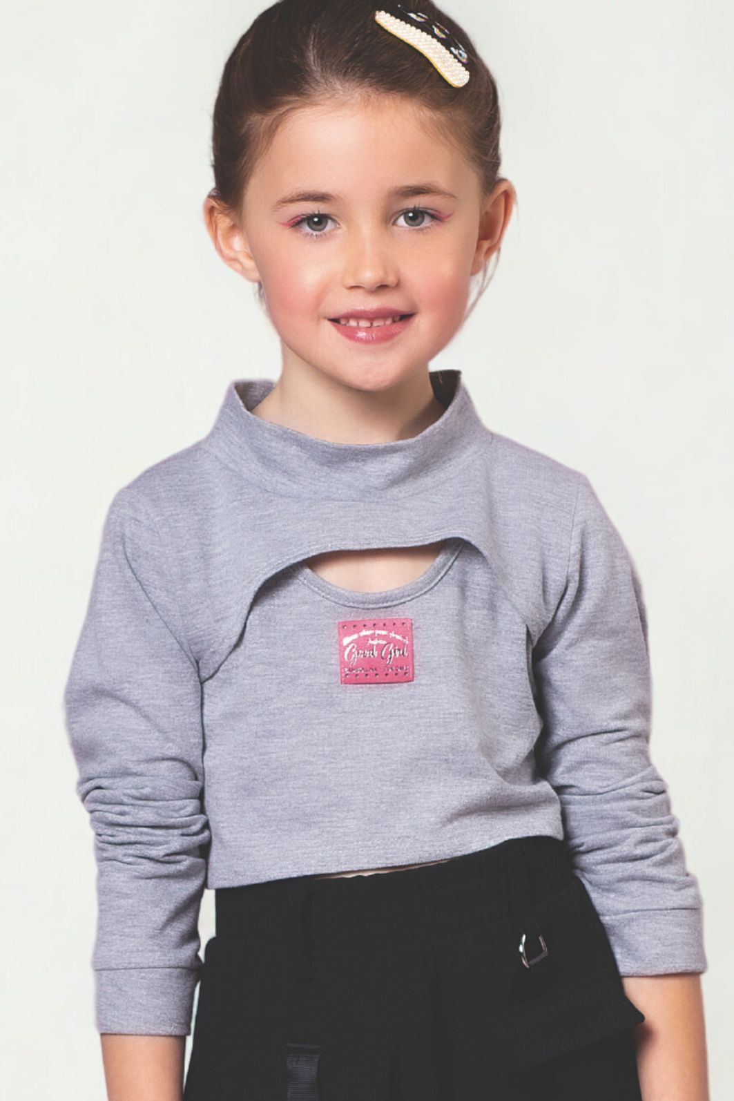 Conjunto blusa com sobreposição e short