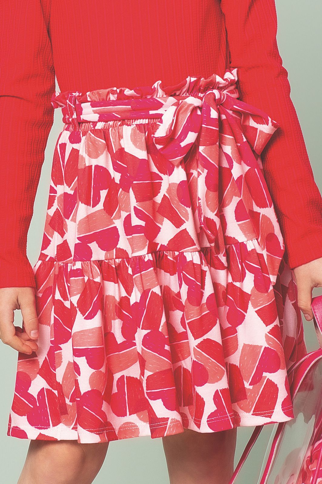 Conjunto blusa manga longa e saia estampa de corações