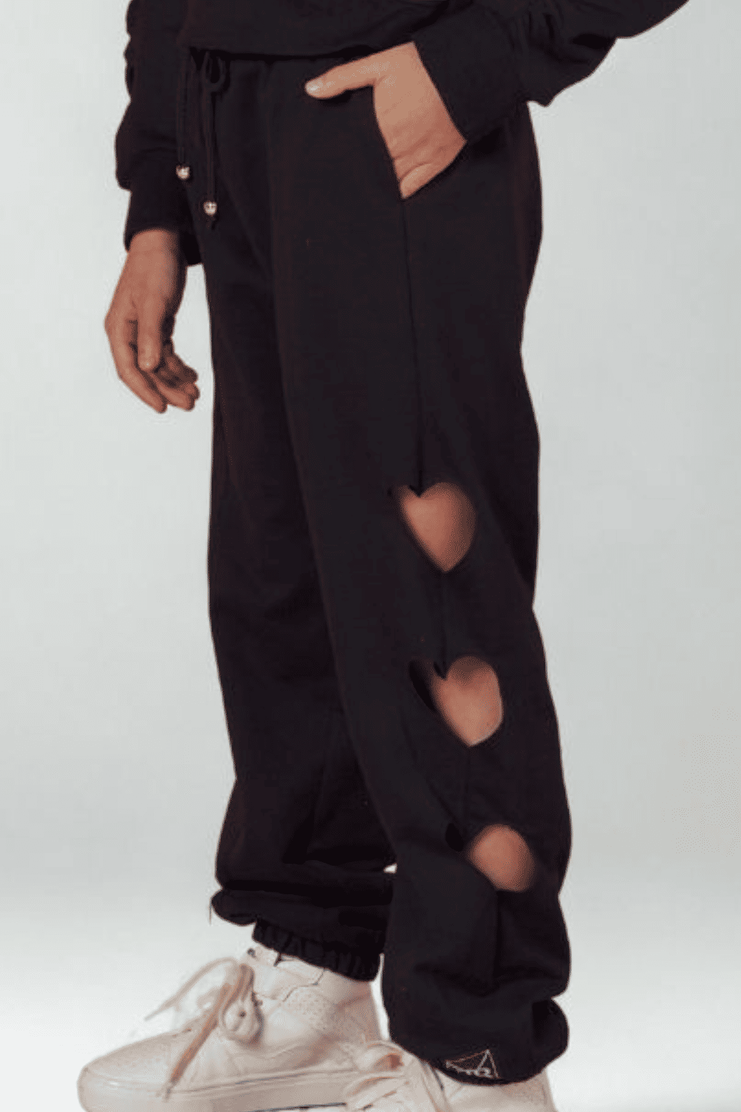 Calça com coração vazado lateral Calça com coração vazado lateral