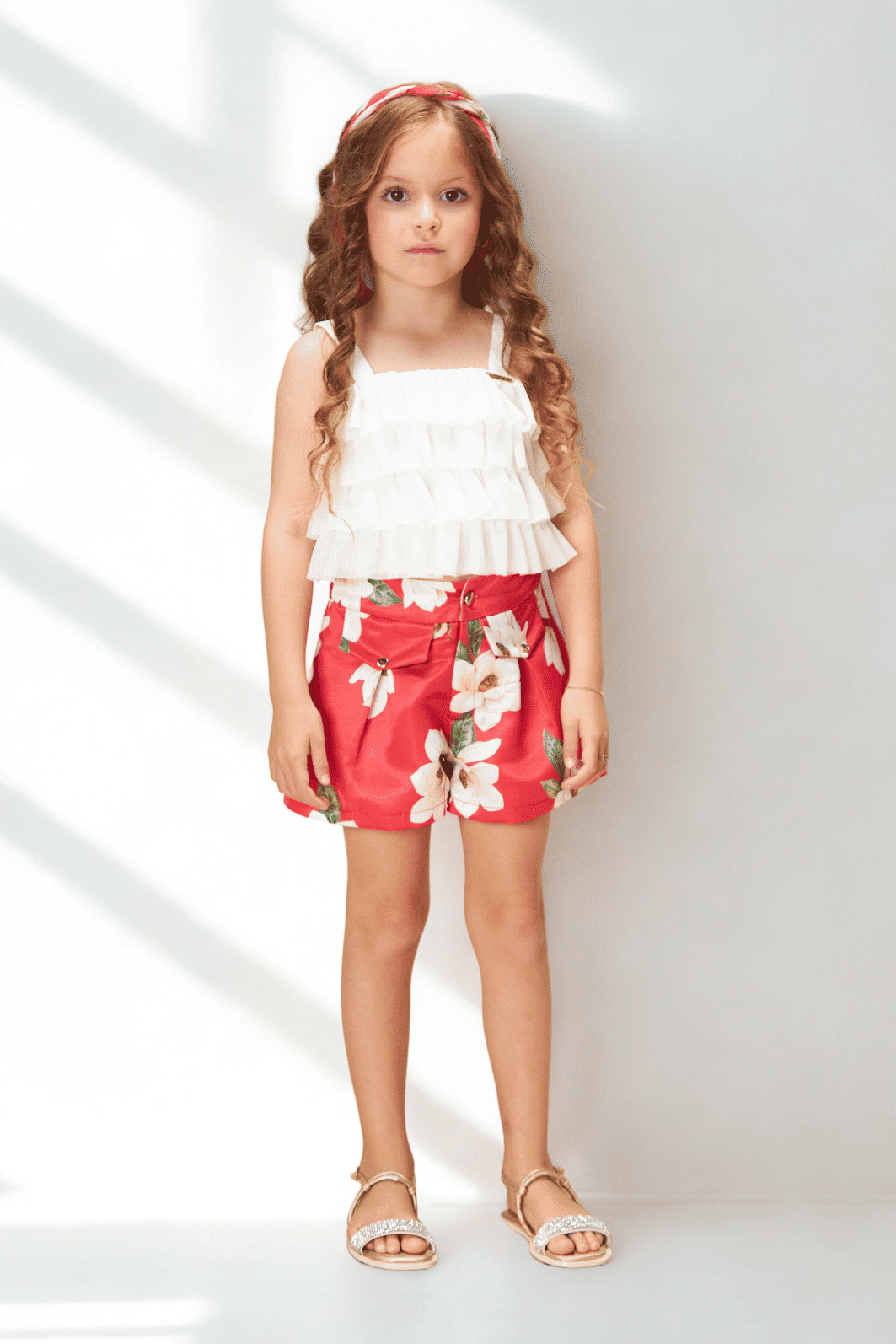 Conjunto blusa cropped de tule e short estampado Conjunto blusa cropped de tule e short estampado