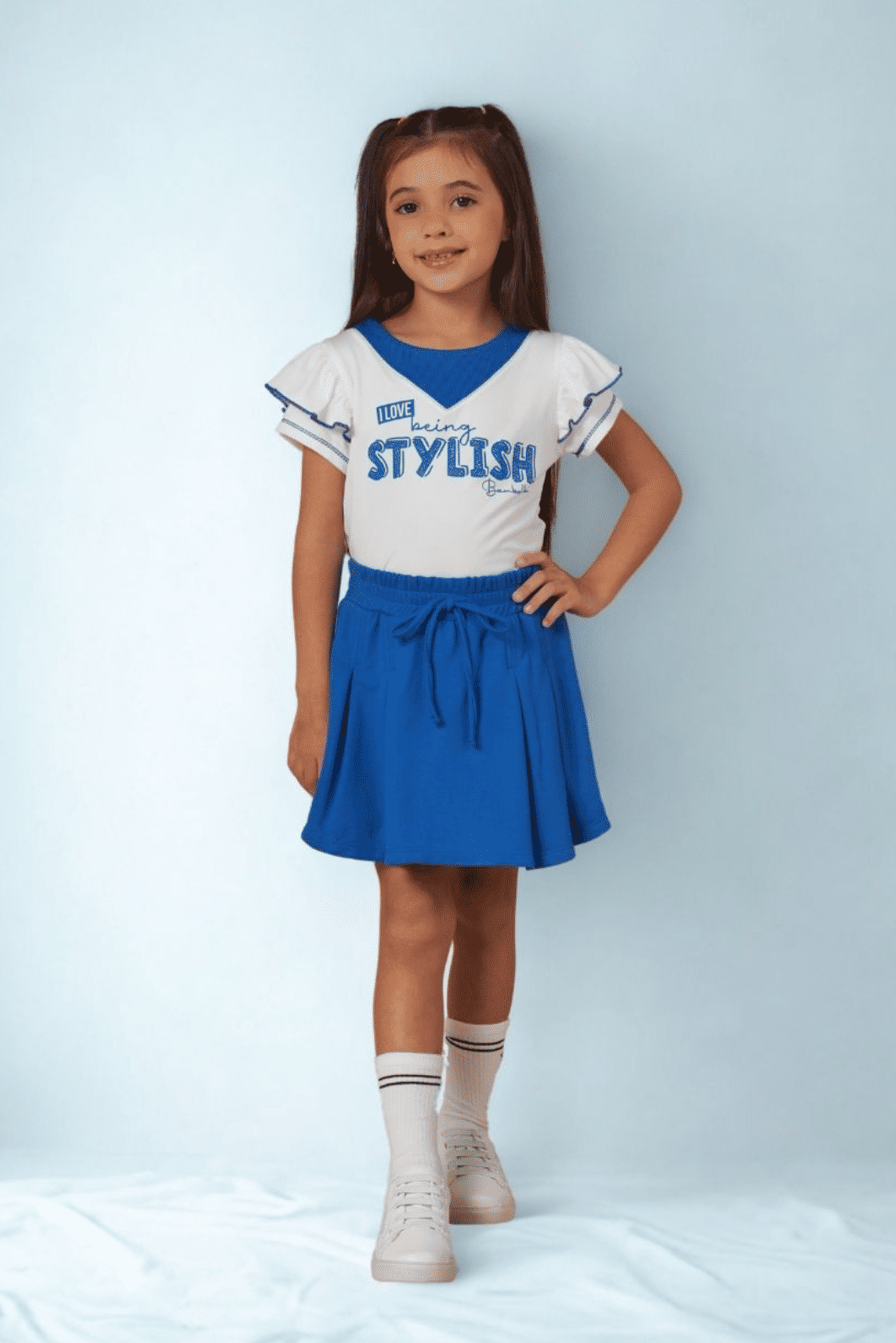 Conjunto blusa de malha com short-saia de moletinho Conjunto blusa de malha com short-saia de moletinho