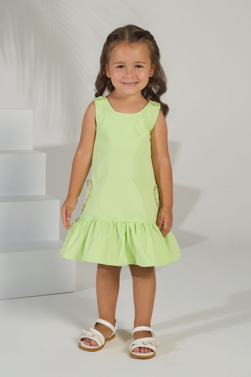 Salopete com bolsos de coração