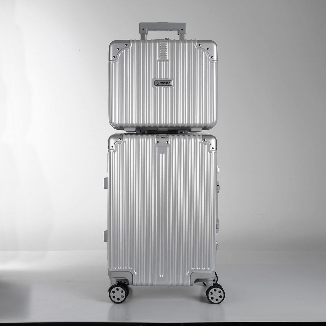 Conjunto Mala de Viagem Grande 32kg Policarbonato ABS Noruega Maloa Prata Conjunto Mala de Viagem Grande 32kg Policarbonato ABS Noruega Maloa Prata