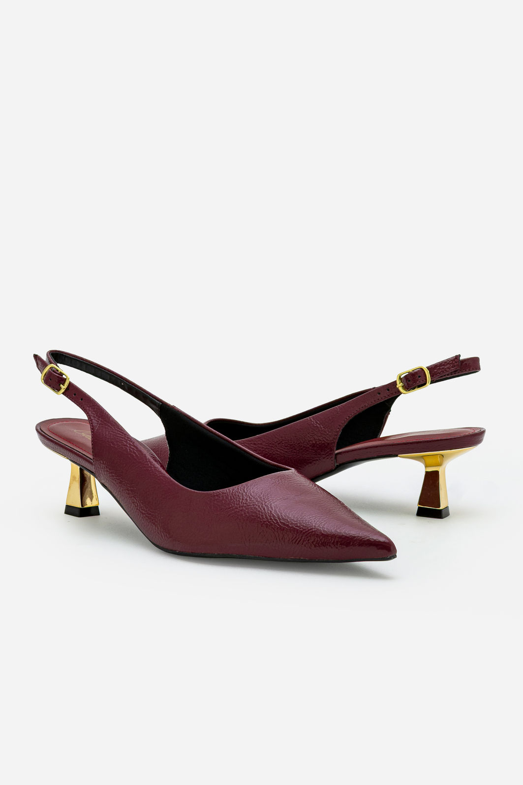 Chanel em Verniz com Salto Cromado Bordo Chanel em Verniz com Salto Cromado Bordo