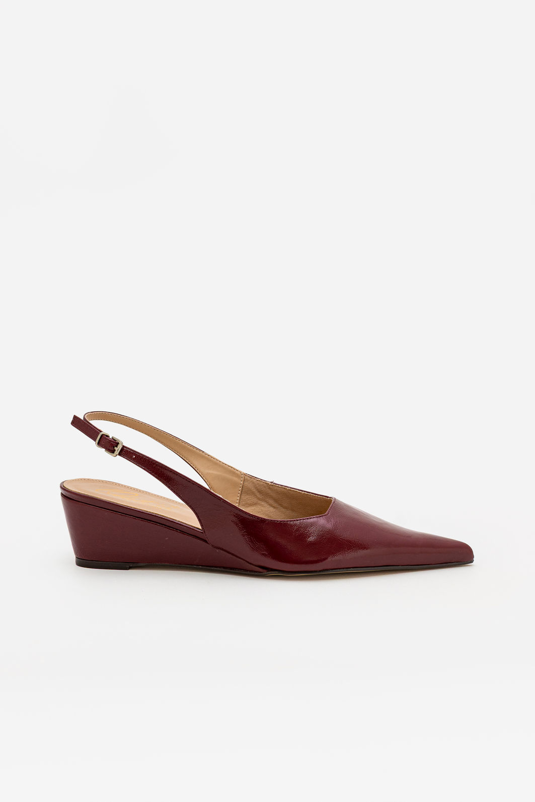 Chanel em Couro Verniz com Salto Anabela Baixo Bordo