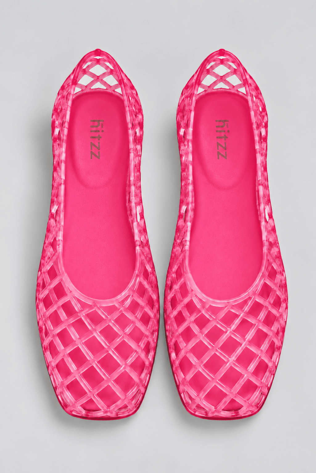 sapatilha-feminina-rosa-gummy Sapatilha Feminina Rosa - Gummy fotografada de cima, em flat lay, com a marca "hitzz" visível no solado interno.