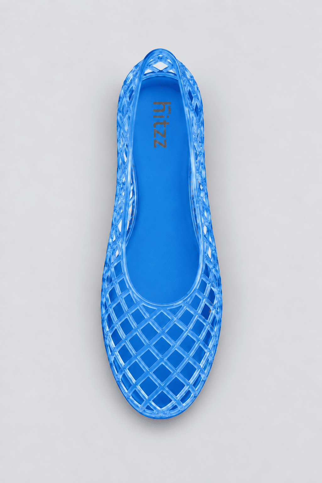 sapatilha-feminina-azul-gummy Sapatilha Feminina Azul - Gummy fotografada de cima, em flat lay, com a marca "hitzz" visível no solado interno.