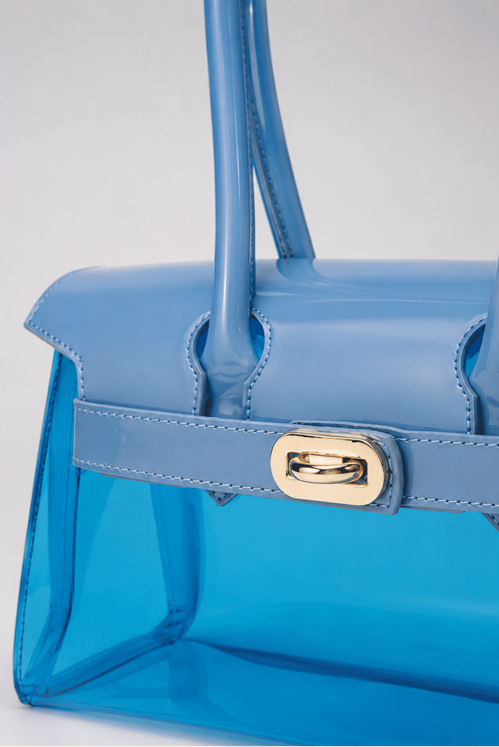 BOLSA FEMININA TRANSPARENTE VERNIZ AZUL CLARO GUMMY BOLSA FEMININA TRANSPARENTE VERNIZ AZUL CLARO GUMMY