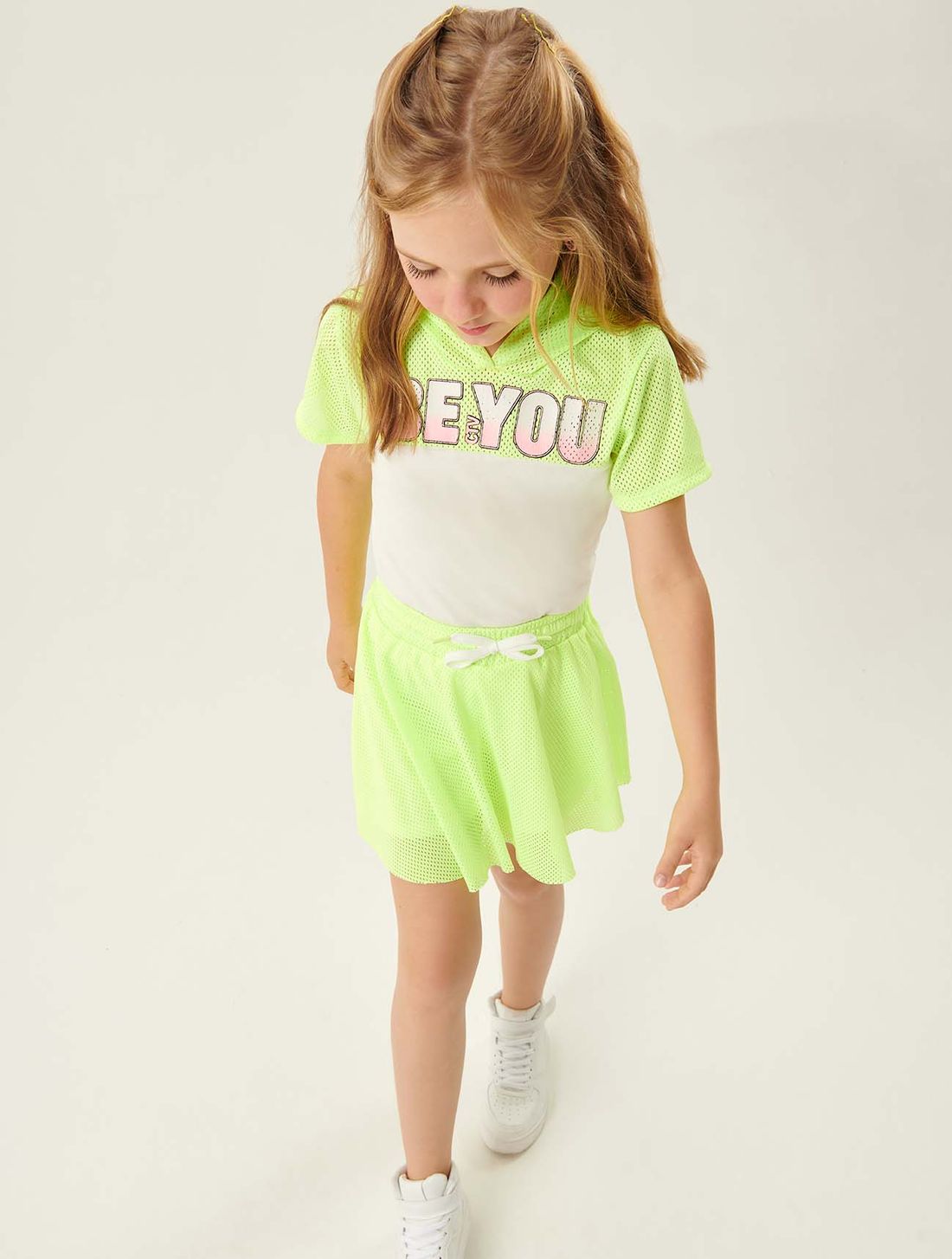 Conjunto Blusa E Short-Saia Com Tela Amarelo Neon E Natural CTV Conjunto Blusa E Short-Saia Com Tela Amarelo Neon E Natural CTV