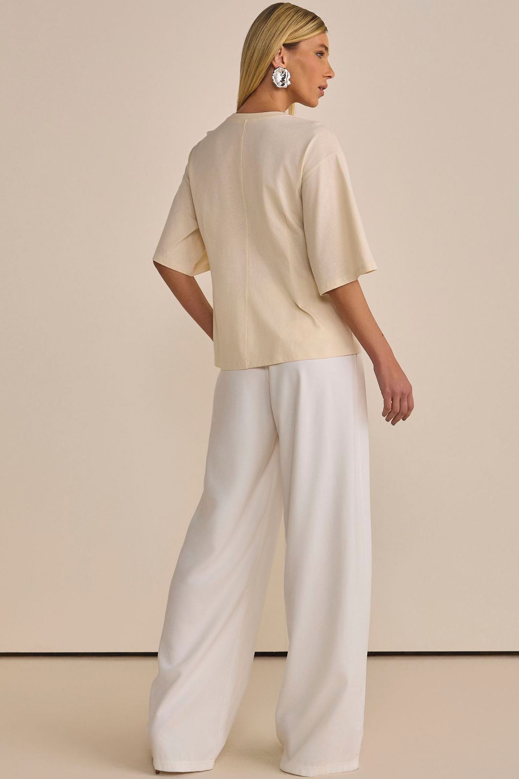 Calça wide leg em tecido estilo alfaiataria com toque de pêssego 89554 Linzzi Calça wide leg em tecido estilo alfaiataria com toque de pêssego 89554 Linzzi