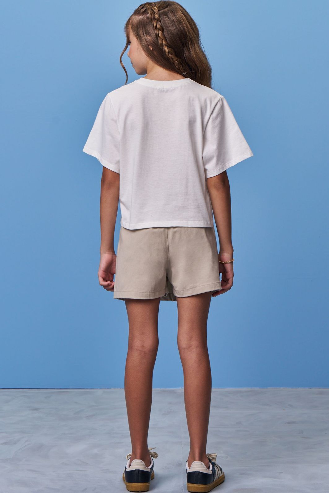 Conjunto de blusa em meia malha e short saia em sarja com elastano 98511 Vic Teen Menina Conjunto de blusa em meia malha e short saia em sarja com elastano 98511 Vic Teen Menina
