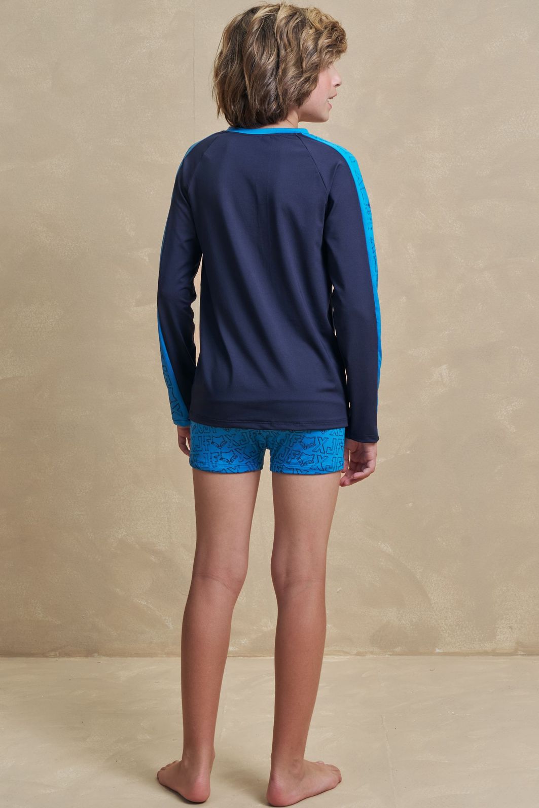 Conjunto de camiseta e sunga em malha uv dry com proteção UV50+ 97324 Johnny Fox Teen Menino Conjunto de camiseta e sunga em malha uv dry com proteção UV50+ 97324 Johnny Fox Teen Menino