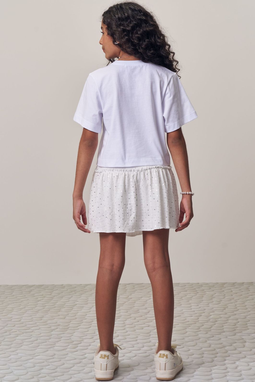 Conjunto de blusa em meia malha e saia em anarruga bordada com shorts embutido 98578 Lilimoon Teen Menina Conjunto de blusa em meia malha e saia em anarruga bordada com shorts embutido 98578 Lilimoon Teen Menina