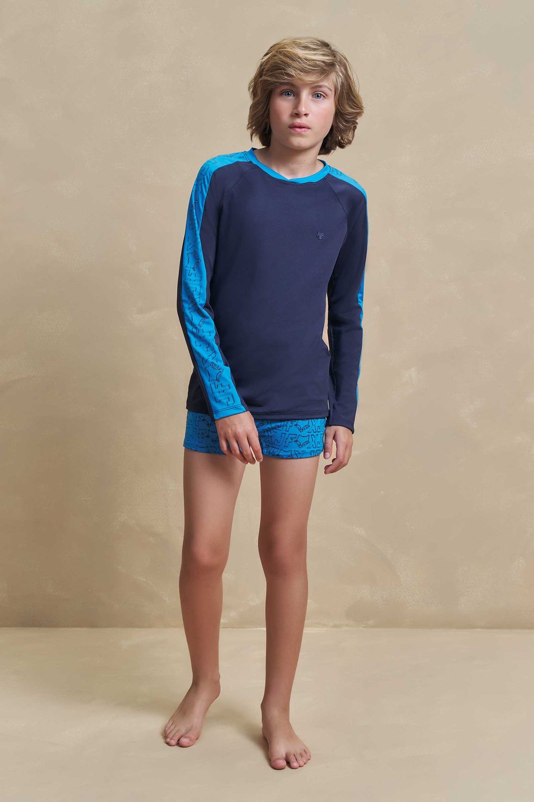 Conjunto de camiseta e sunga em malha uv dry com proteção UV50+ 97324 Johnny Fox Teen Menino Conjunto de camiseta e sunga em malha uv dry com proteção UV50+ 97324 Johnny Fox Teen Menino