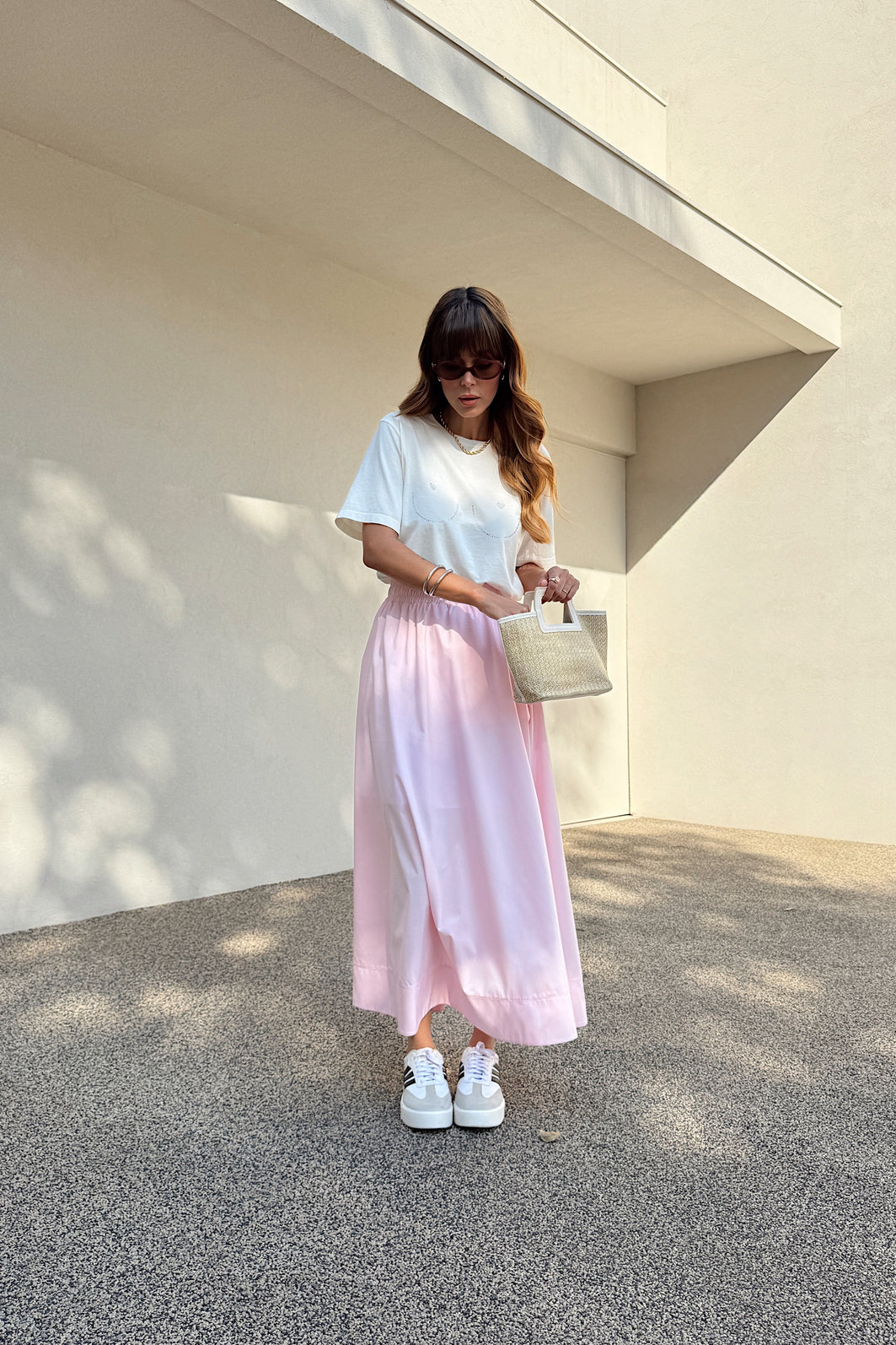 SAIA MIDI COM BOLSOS E FORRO LIVIA ROSA CLARO