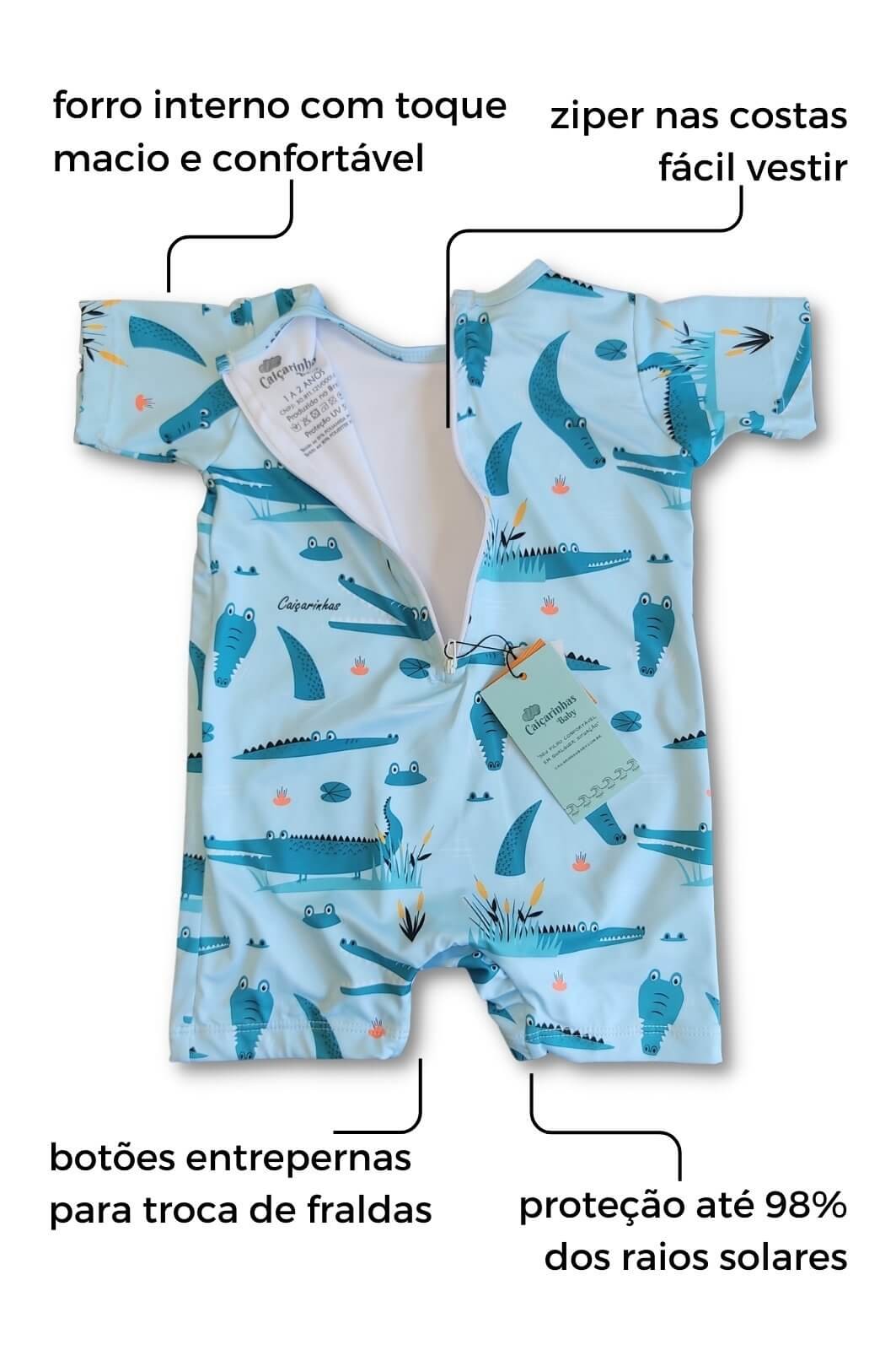 Macacão Praia Bebê Proteção Solar UV 50+ Manga Curta Azul Jacaré Macacão Praia Bebê Proteção Solar UV 50+ Manga Curta Azul Jacaré