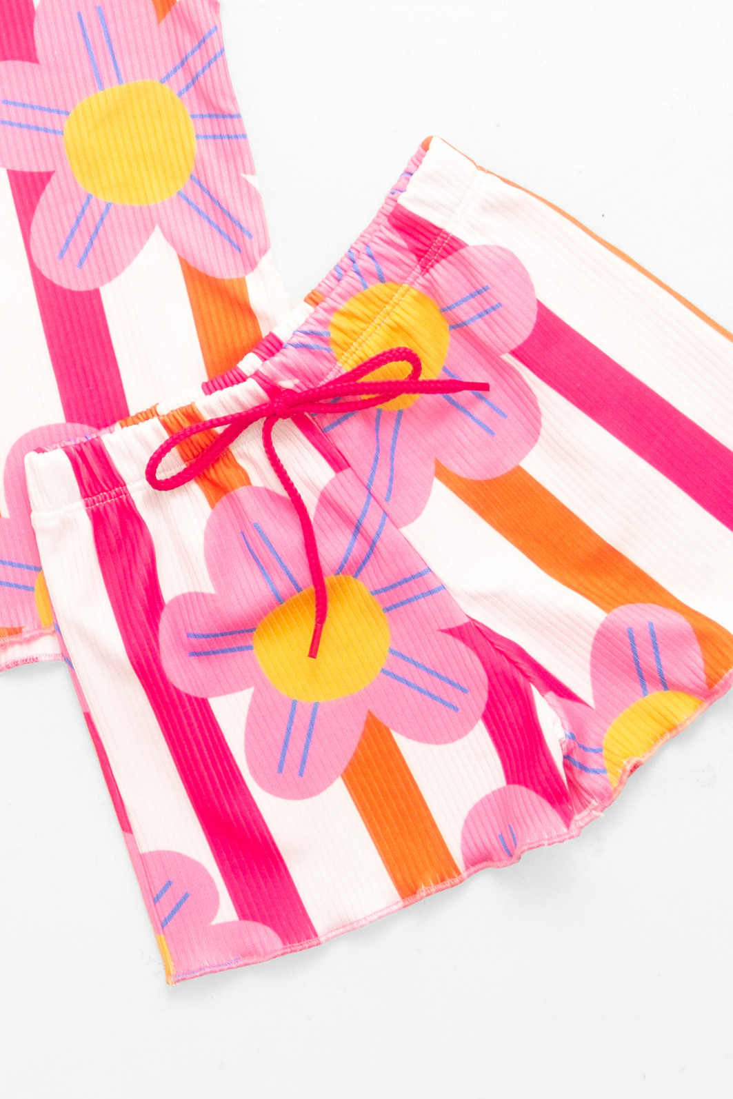 CONJUNTO MENINA BLUSA E SHORTS POWER FLOWER