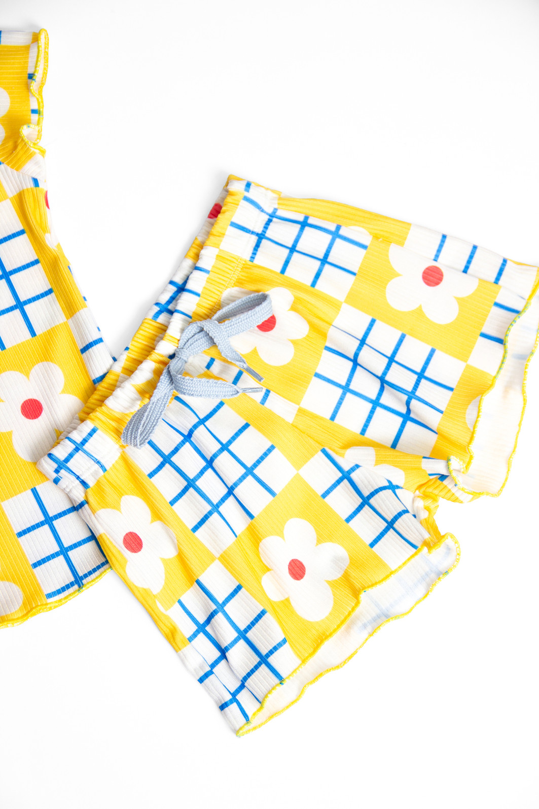 CONJUNTO MENINA BLUSA E SHORTS XADREZ FLORAL