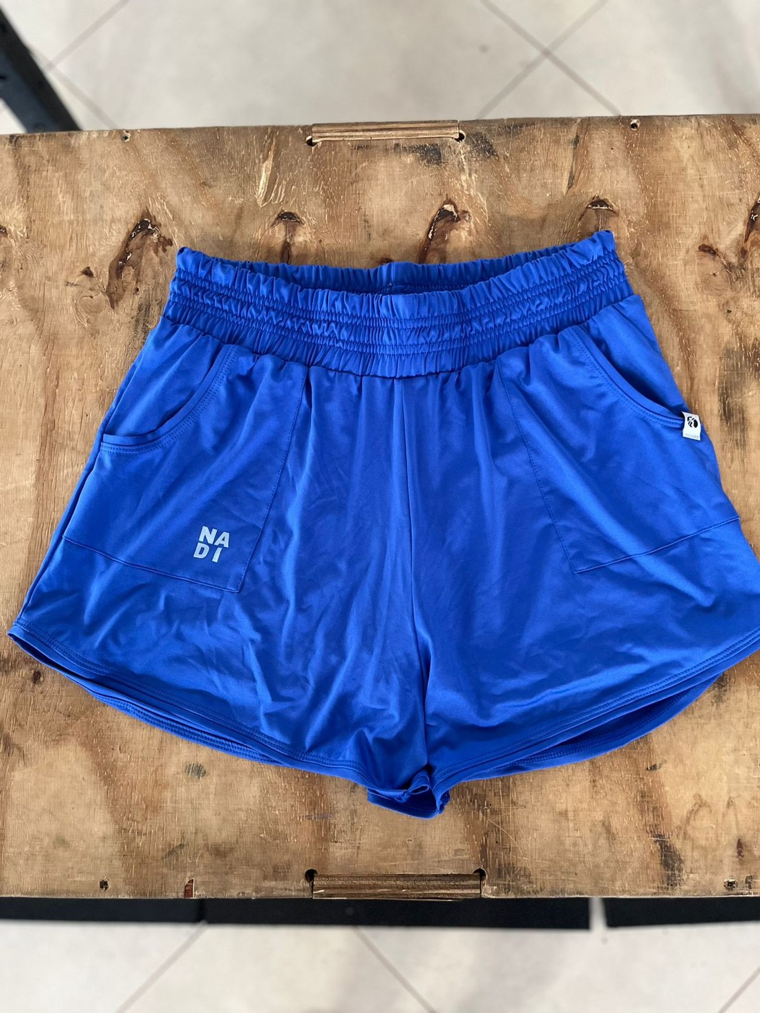shorts duplo com bolso azul royal