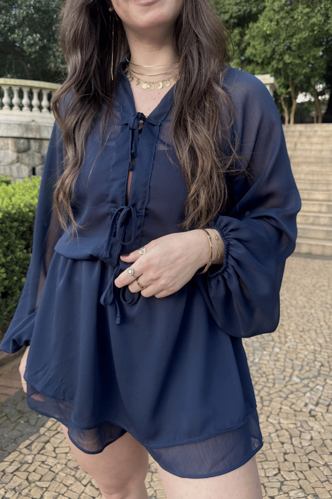 Macaquinho vestido com manga longa em chiffon azul Macaquinho vestido com manga longa em chiffon azul