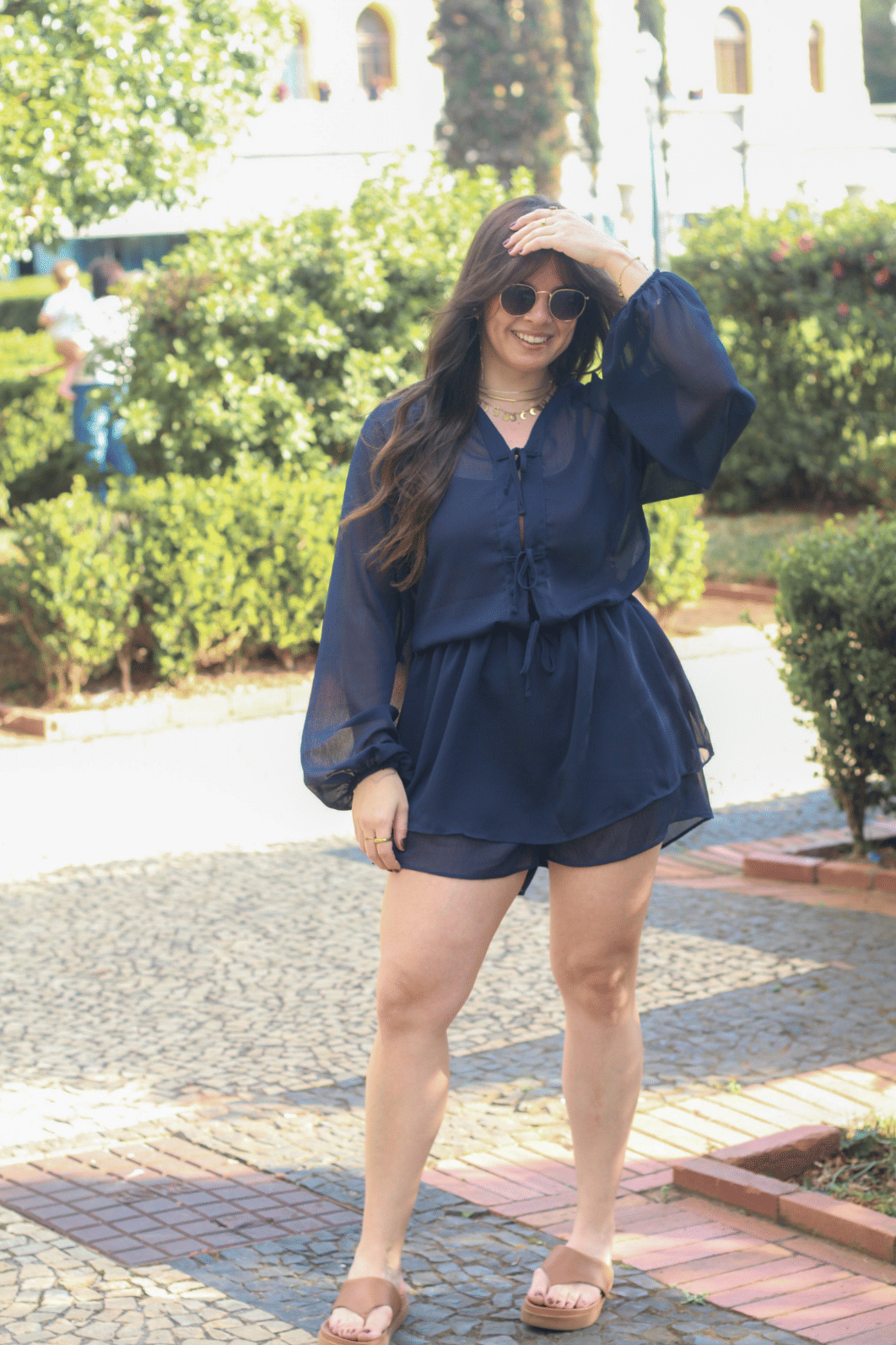 Macaquinho vestido com manga longa em chiffon azul Macaquinho vestido com manga longa em chiffon azul