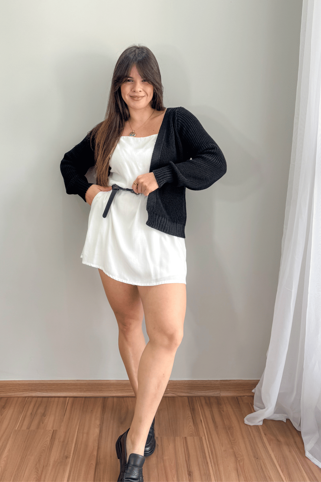 Cardigan curto em tricô preto Cardigan curto em tricô preto