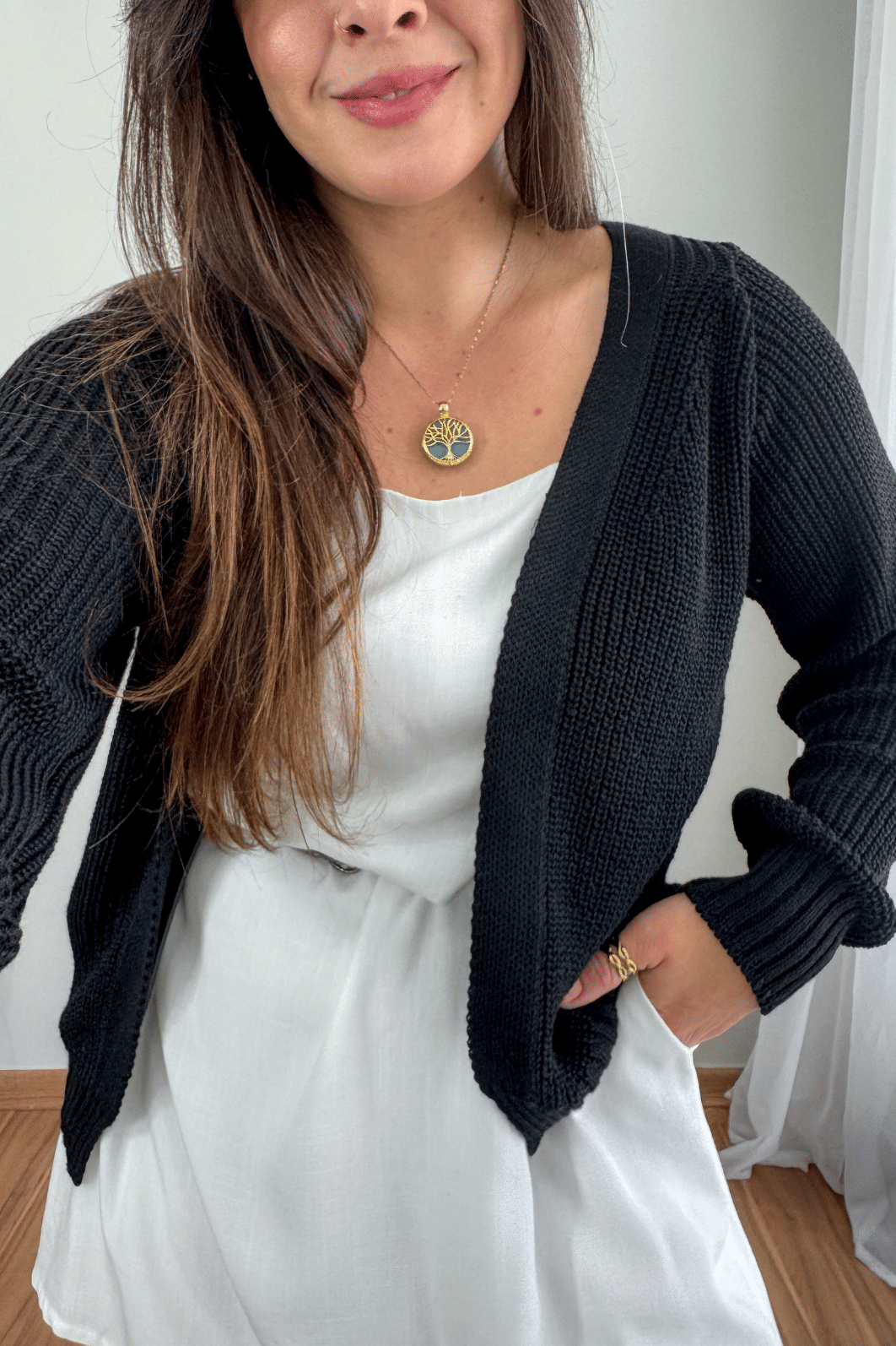 Cardigan curto em tricô preto Cardigan curto em tricô preto