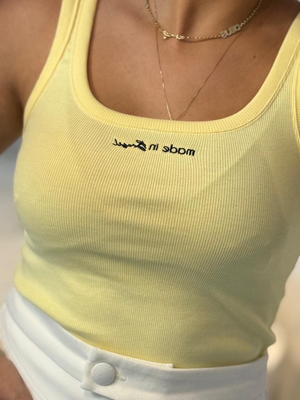 Regata Feminina Edição Copa do Mundo Amarelo Manteiga Regata Feminina Edição Copa do Mundo Amarelo Manteiga