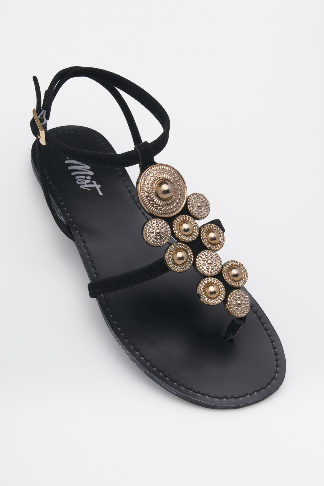 Detalhe do cabedal da Rasteira Uyara Preta Mist Rasteira Uyara Preta com aplicações douradas